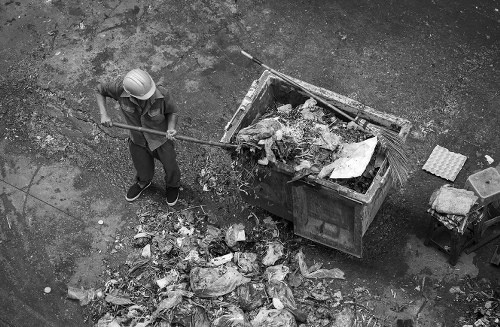 Construction site with builders waste being removed in Brompton